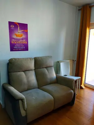 Coin salon dans l'établissement Apartement 2 rooms Saint Louis - Euroairport - Basel - Train station