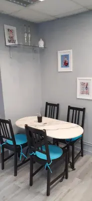 Coin salon dans l'établissement Au Coup de Cœur