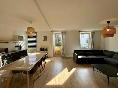 Coin salon dans l'établissement Charmant Appartement Mulhouse