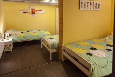 Un ou plusieurs lits dans un hébergement de l'établissement Gîte les Cigogneaux