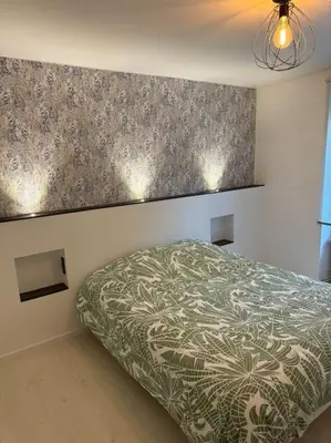 Un ou plusieurs lits dans un hébergement de l'établissement Appartement la citadelle