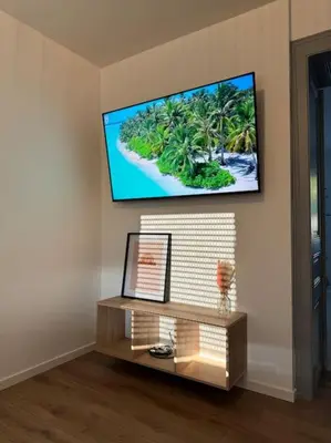 Télévision ou salle de divertissement dans l'établissement Appartement la citadelle