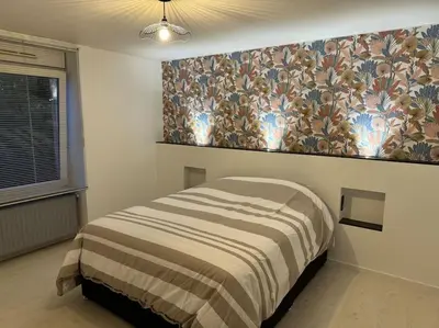 Un ou plusieurs lits dans un hébergement de l'établissement Appartement la citadelle