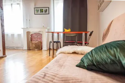 Un ou plusieurs lits dans un hébergement de l'établissement Harmony Appart FRANCE & SUISSE