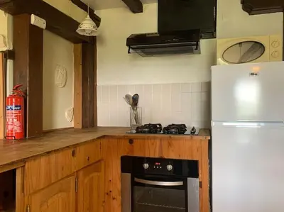 Cuisine ou kitchenette dans l'établissement Gîte Au bout des Mynes avec vue panoramique