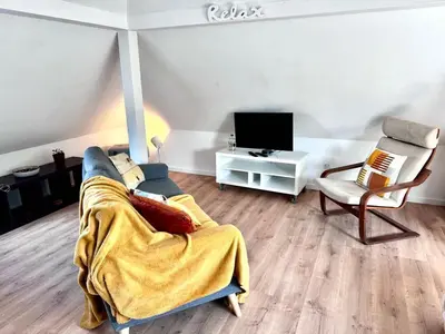 Télévision ou salle de divertissement dans l'établissement Au pieds du vignoble Colmarien
