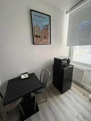 Coin salon dans l'établissement L Alsacienne F2 centre ville