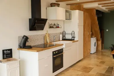 Cuisine ou kitchenette dans l'établissement Duplex vue sur les montagnes - Orbey