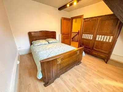 Un ou plusieurs lits dans un hébergement de l'établissement Central & quiet, Full apt for 8 Trésor caché