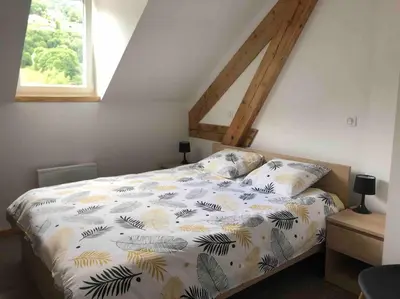 Un ou plusieurs lits dans un hébergement de l'établissement Appartement Des 2 Vallées,proche de tous commerces