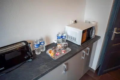 Cuisine ou kitchenette dans l'établissement Riedheim - Colmar proche gare - Charme, Confort et Calme
