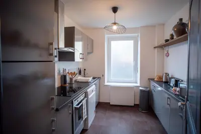 Cuisine ou kitchenette dans l'établissement Riedheim - Colmar proche gare - Charme, Confort et Calme