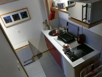 Cuisine ou kitchenette dans l'établissement Les Trois Lanternes