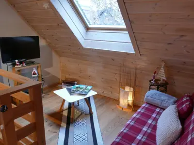 Télévision ou salle de divertissement dans l'établissement Les Trois Lanternes