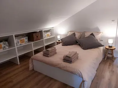 Un ou plusieurs lits dans un hébergement de l'établissement Maison 120 m2 à Gerardmer proche centre ville