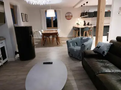 Coin salon dans l'établissement Maison 120 m2 à Gerardmer proche centre ville