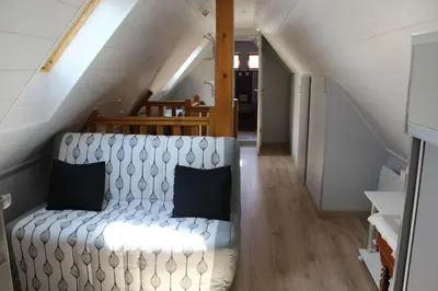 Coin salon dans l'établissement Garte Hiesel la maison de jardin Piscine été 2026