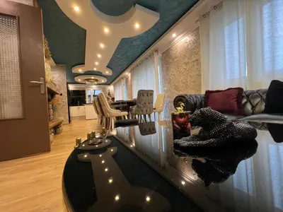 Coin salon dans l'établissement Maison De Luxe Pour 14 personnes - SPA - Billard - Sport - Baby-foot