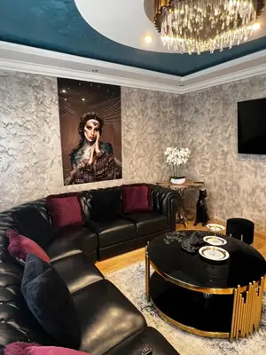 Coin salon dans l'établissement Maison De Luxe Pour 14 personnes - SPA - Billard - Sport - Baby-foot