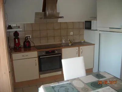 Cuisine ou kitchenette dans l'établissement gîte le callinet