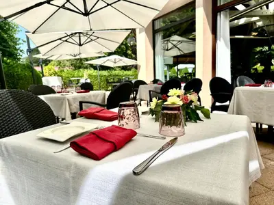 Restaurant ou autre lieu de restauration dans l'établissement Résidence Les Vallées Labellemontagne