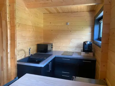 Cuisine ou kitchenette dans l'établissement Chalet