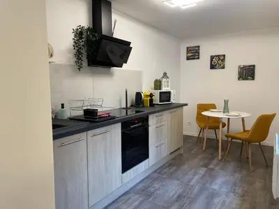 Cuisine ou kitchenette dans l'établissement Cosy appart en plein centre - 2 guests