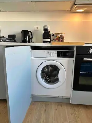 Cuisine ou kitchenette dans l'établissement Blue pearl