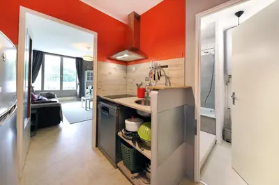 Cuisine ou kitchenette dans l'établissement Le Carbet des Oursons - Appt à Bresse vue montagne