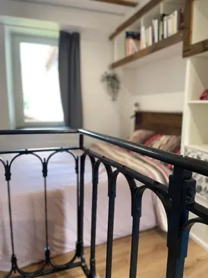 Un ou plusieurs lits dans un hébergement de l'établissement Appartement lac et montagne