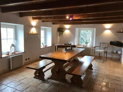 Coin salon dans l'établissement Ferme de Chenezeau - 15 personnes , 7 chambres