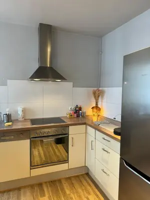 Cuisine ou kitchenette dans l'établissement Les 6 Cordiers au coeur de ville