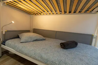 Un ou plusieurs lits dans un hébergement de l'établissement Appartement cosy et lumineux à Kaysersberg