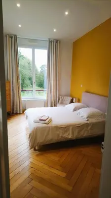 Un ou plusieurs lits dans un hébergement de l'établissement Chambres d'hôtes au Château Léon