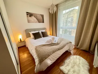 Un ou plusieurs lits dans un hébergement de l'établissement Bienvenue au Raio de Sol - Centre Ville - 2 Guests