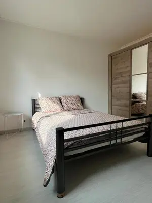 Un ou plusieurs lits dans un hébergement de l'établissement Très belle maison