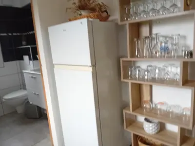 Cuisine ou kitchenette dans l'établissement les chalets Lololange