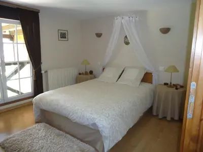 Un ou plusieurs lits dans un hébergement de l'établissement La grange de Manu