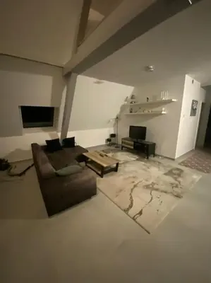 Télévision ou salle de divertissement dans l'établissement Appartement tranquille