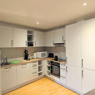 Cuisine ou kitchenette dans l'établissement Au Soleil - Appartement confortable