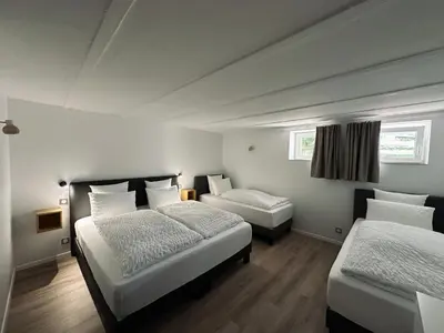 Un ou plusieurs lits dans un hébergement de l'établissement Le Parc 96 - Gîte aux Portes de Colmar