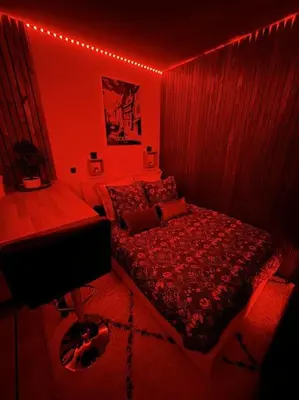 Un ou plusieurs lits dans un hébergement de l'établissement Gîte Studio Alsa 15 avec Jacuzzi privatif