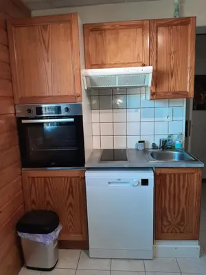 Cuisine ou kitchenette dans l'établissement F2 lumineux en centre ville - Gerardmer