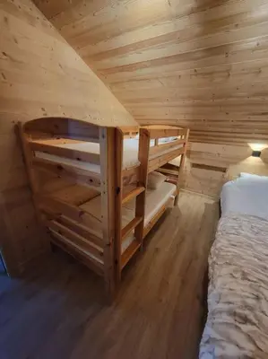 Un ou plusieurs lits dans un hébergement de l'établissement Chalet à louer, Spa, sauna, billard, gerardmer
