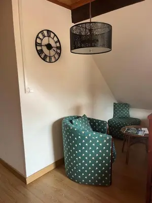 Coin salon dans l'établissement Home sweet home