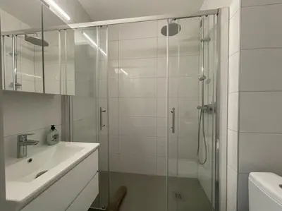 Salle de bains dans l'établissement T2 Elio - proche gare et aéroport, parking privé
