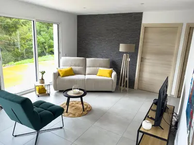 Coin salon dans l'établissement Gîte chêne