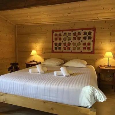 Un ou plusieurs lits dans un hébergement de l'établissement Chalet des Belles Roches, 14 pers, garden, sauna