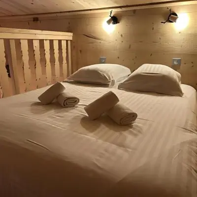 Un ou plusieurs lits dans un hébergement de l'établissement Chalet des Belles Roches, 14 pers, garden, sauna