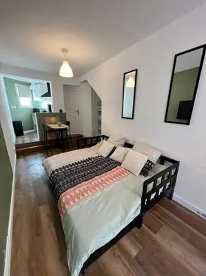 Un ou plusieurs lits dans un hébergement de l'établissement Appartement plein centre-ville